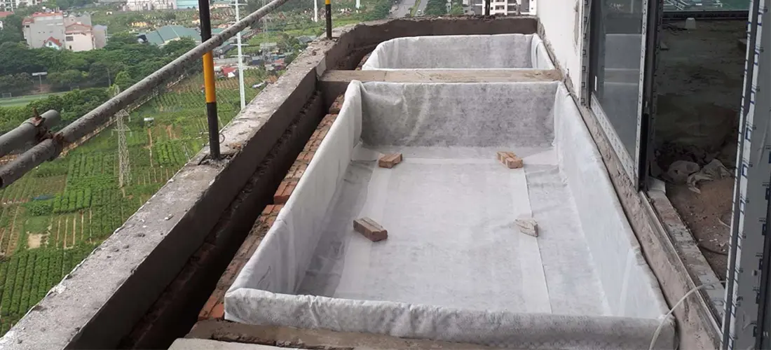 Rải vải địa kỹ thuật trồng cây lên trên